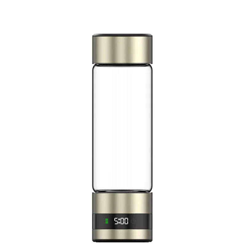Clear glass Lenniemart Hydrogen Water Bottle with gold metal cap and base on a white background